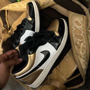 Gold toe Jordan 1 lows